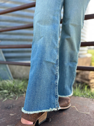 Close-up of blue jeans with a blurred background