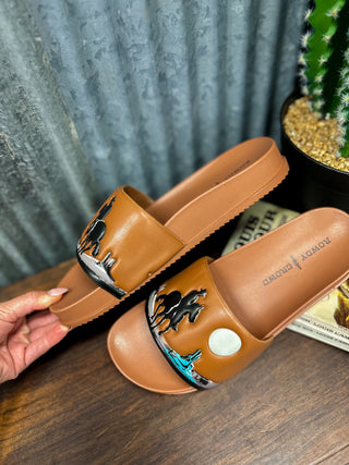 Brown slides with decorative elements on a wooden surface