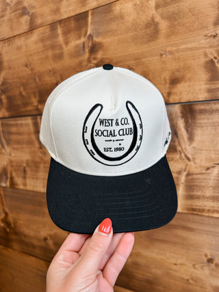 The West & Co Social Club Trucker Hat