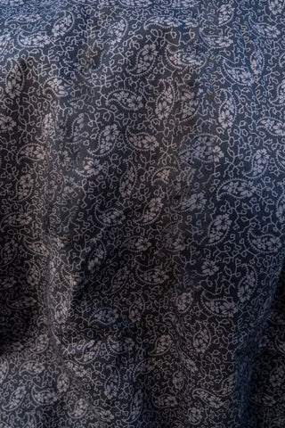 Dark blue fabric with a subtle pattern