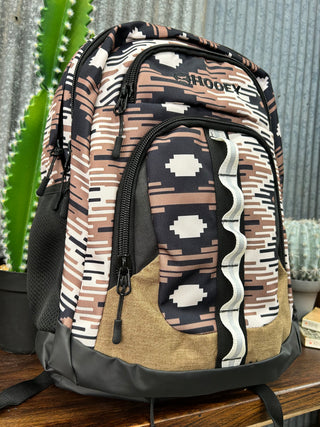 Backpack with geometric pattern on a metal surface