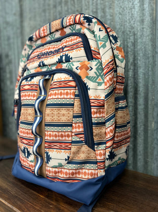 Backpack with a colorful pattern on a wooden surface