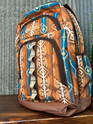 Patterned bag with tribal design on a textured surface