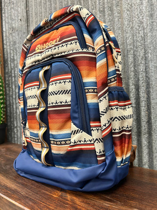 Backpack with tribal pattern on a wooden surface