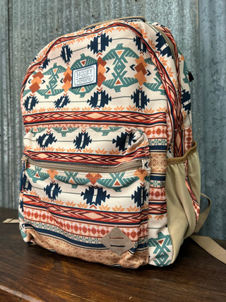 Backpack with tribal pattern on a wooden surface