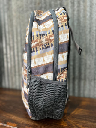 Backpack with tribal pattern on a wooden surface