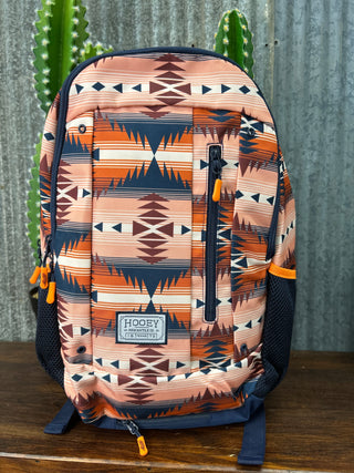 Backpack with geometric pattern on a textured surface