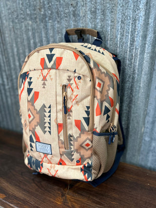 Backpack with geometric pattern on a wooden surface and metal wall background