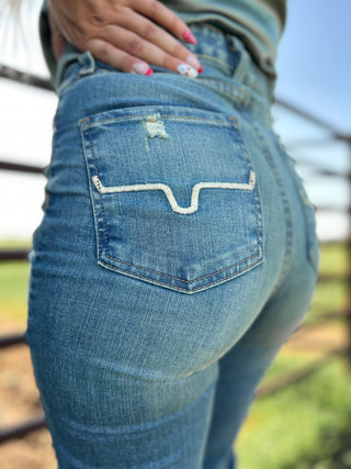 Close-up of blue jeans with a blurred background
