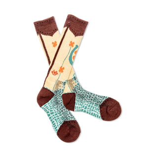 Pair of socks with brown tops and cuffs, beige patterned middle, and green textured bottom on a white background