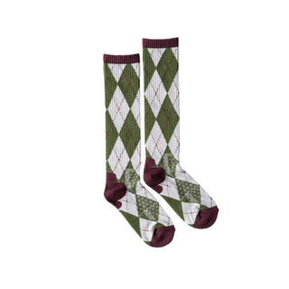 Pair of green and white argyle pattern socks with purple accents on a white background