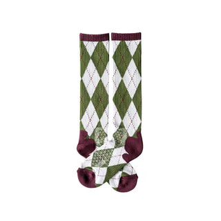 Green and white argyle patterned socks with purple accents on a white background