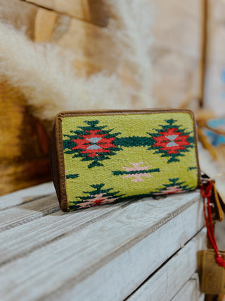 Handmade wallet with geometric pattern on a wooden surface