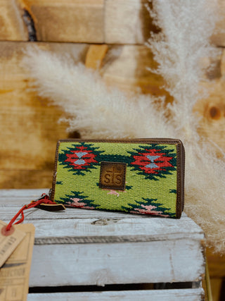 Handcrafted wallet with geometric pattern on a wooden surface