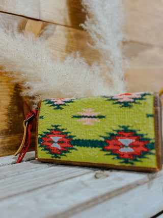 Small pouch with geometric pattern on a wooden surface