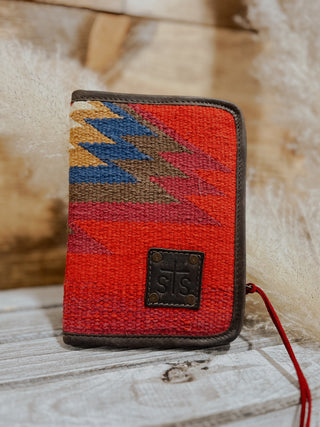 Small pouch with geometric pattern on a textured surface