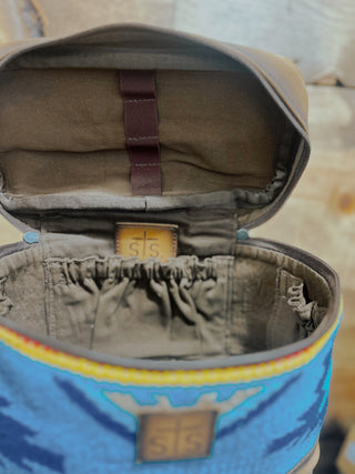 Open beige bag with a visible brand logo on a blurred background