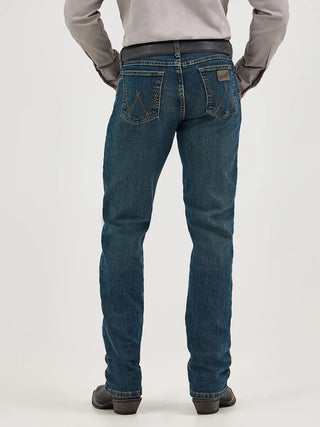 Person wearing blue jeans on a white background