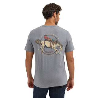 Man wearing a gray t-shirt with a horse and rider graphic on the back, on a white background