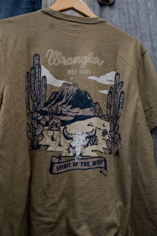 Brown t-shirt with desert graphic and 'Wrangler' branding on a wooden hanger.